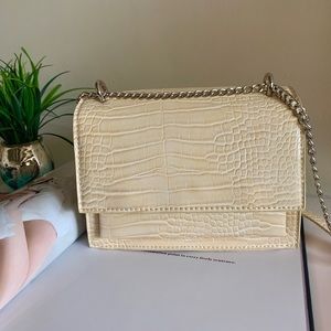 Crocodile embossed handbag
